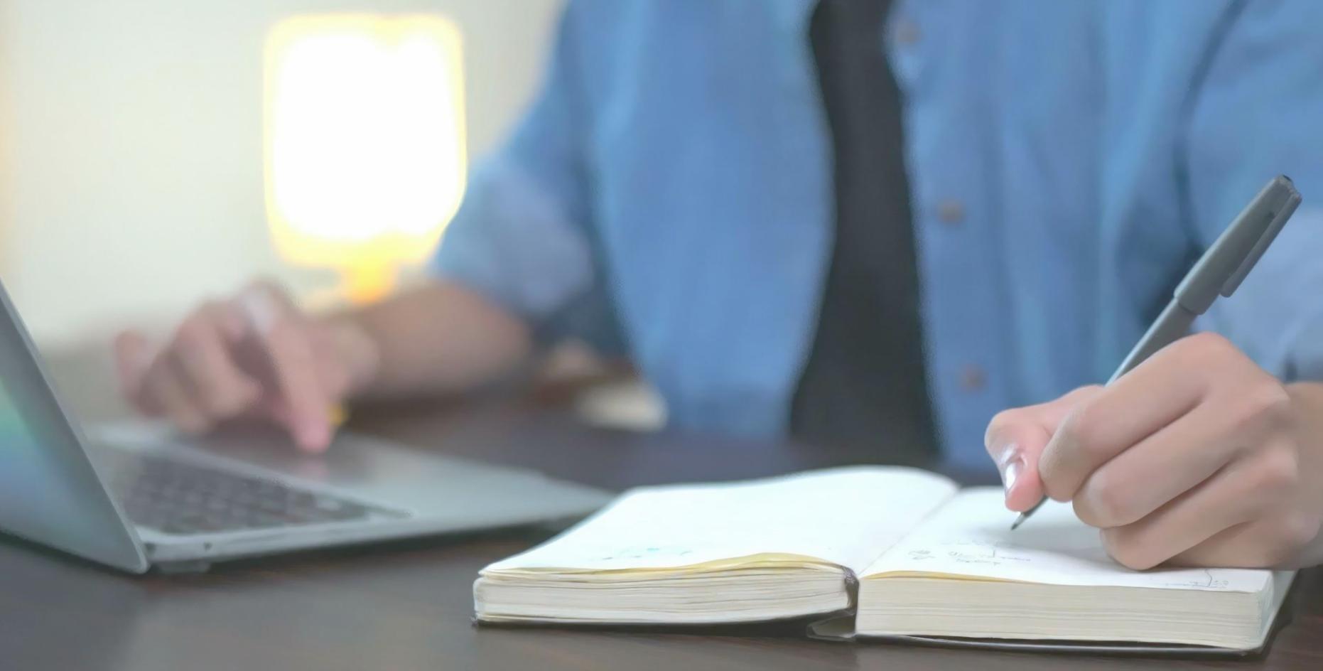 Business professional reviewing detailed financial benchmarking reports